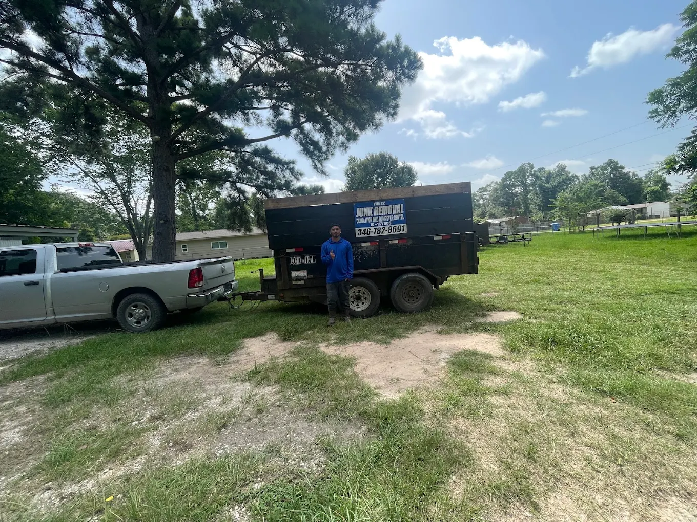 Yanez crew member with the junk removal truck in Porter, TX